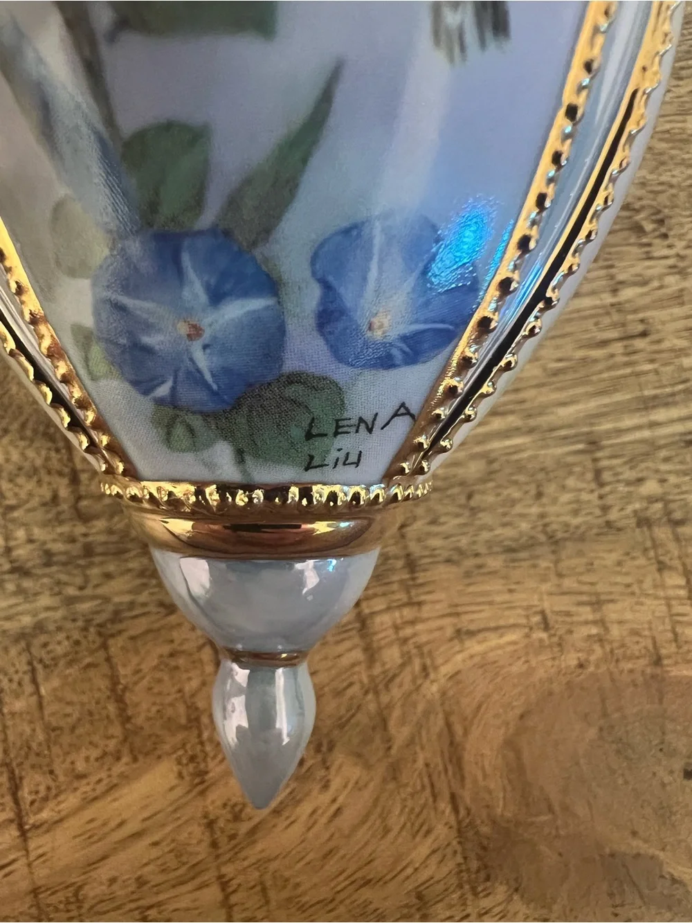 Lena Liu Porcelain Hummingbird Egg Ornament with Blue Floral Design